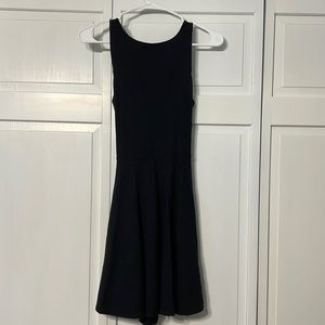 Hollister. Women’s small. Black dress with cross-cross cutout on back.